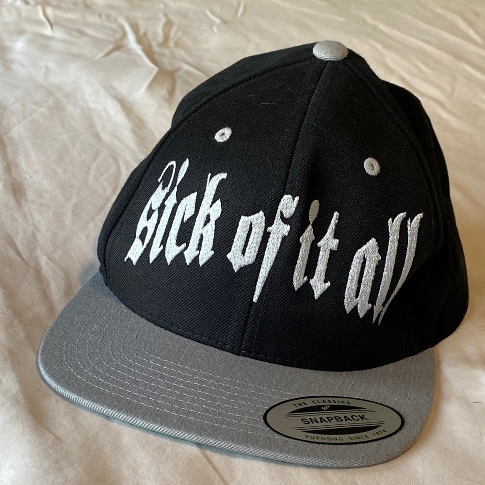 New black and gray "Sick of It All" snapback hat